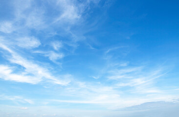 Wall Mural - blue sky background and white clouds soft focus