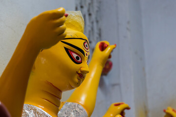 Close up of Goddess Durga face with use of selective focus.