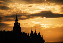 Silhouette Of A Church In Sunset With Orange Sky. Paris