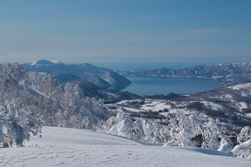 Snowy winter view of Lake Toya landscape from above, Hokkaido, Japan