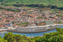 Overview From Above Of Colorful Buildings Of Historic Angra Do Heroismo,  Marina, And Green Farmland  As Seen From Monte Brasil, Terceira, Azores.