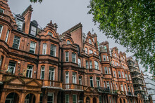 Facade Of English Victorian Style Terraced Townhouses In Chelsea London