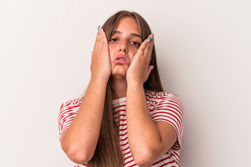 Wall Mural - Young caucasian woman isolated on white background whining and crying disconsolately.