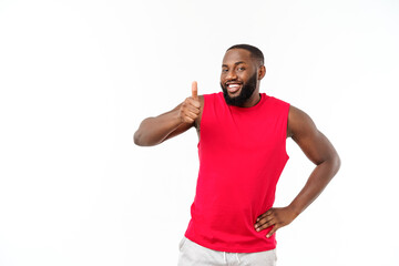 Young african american man over isolated background wearing sport wear smiling with happy face looking with thumb up.