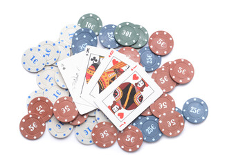 Poker chips and playing cards on white background