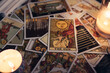 Tarot cards. THE SUN card on tarot cards with candles. Astrologists and fortune teller concept.