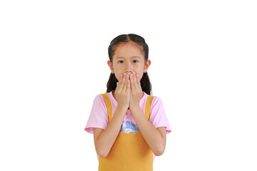 Wall Mural - Pretty Asian little girl kid covering her mouth with a hands isolated over white background