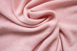 © Алекс Ренко - The texture of the pink cashmere sweater. Top view, close-up.