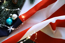 Merry Christmas And Happy New Year. Beautiful Card With American Flag. Beautiful Christmas Background With Medical Mask.
