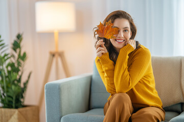 Wall Mural - woman resting on sofa at home