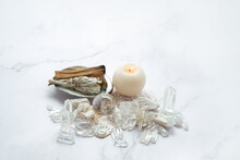 Clear Quartz Minerals, Candle, Palo Santo, White Sage Bundle On Abalone Sea Shell. Incense For Fumigation. Wiccan Witchcraft. Esoteric Spiritual Practice For Cleansing, Good Energy, Life Balance