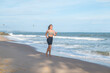 © Aleksandr - Sporty fit active sexy young blonde woman in sportswear jogging on the beach. Beautiful girl running oby the sea. Healthy lifestyle concept, ocean