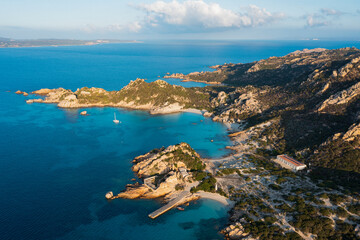 Wall Mural - View from above, aerial shot, stunning panoramic view of Spargi Island with Cala Corsara, a white sand beach bathed by a turquoise water. La Maddalena archipelago National Park, Sardinia, Italy.
