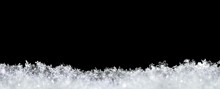 Natural Snow Texture With Snowflakes Close-up, Isolated On Black Background With Space For Text On Top. Template For Holiday Gift Cards. Macro Texture Of Snow. Big Large Size.