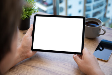 male hand holding computer tablet with isolated screen in office