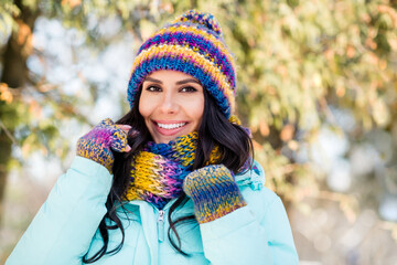 Sticker - Photo of positive charming lady shiny white smile wear knitted mittens hat scarf coat in park outdoors