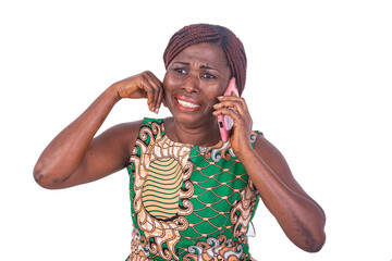 adult woman is crying while having received bad news speaking on mobile phone.