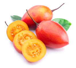 Canvas Print - Ripe tamarillo fruits with slices and tamarillo leaves isolated on a white background.