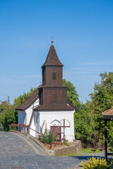 Wall Mural - Old church of St. Martin on the street in ethnic village Holloko, Hungary