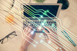 © peshkova - Multi exposure of man's hands typing over computer keyboard and data theme hologram drawing. Top view. Technology concept.