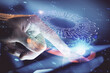 © peshkova - Multi exposure of man's hand holding and using a digital device and data theme drawing. Innovation concept.