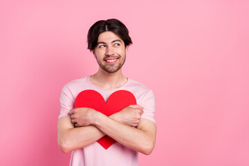 Sticker - Photo portrait man embracing red paper heart looking copyspace isolated pastel pink color background