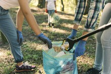 Volunteers cleaning up the city park