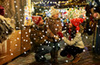 © Syda Productions - family, winter holidays and celebration concept - happy mother, father and little daughter at christmas market on town hall square in tallinn, estonia over snow