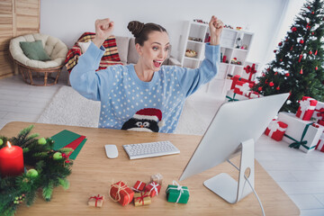 Poster - Portrait of attractive cheerful lucky girl using pc having fun rejoicing staying alone at home flat indoors