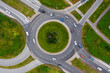 © Cavan Images - Roundabout on green landscape seen from above.