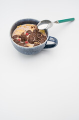 Sticker - Tasty breakfast with milk and chocolate cereal in a bowl