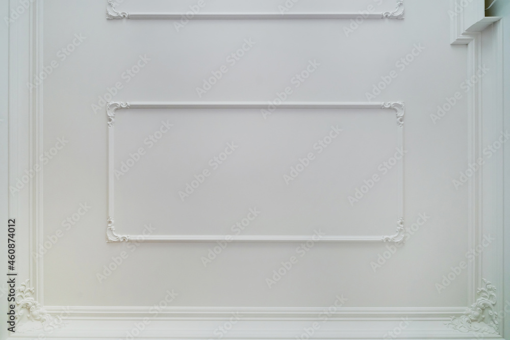 Detail of corner ceiling cornice with intricate crown molding.