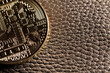 © StudioWout - Crypto coin on leather
