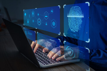 Fingerprint scan for secure access to protected data network with biometrics. Person using finger print authentication technology on laptop computer to login on private system.