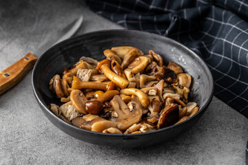 Poster - Sliced preserved mushrooms in bowl.