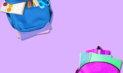 Wall Mural - Backpack with colorful school supplies on the background. Back to school.