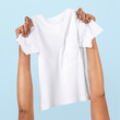 © Rawpixel.com - Hand holding t-shirt kids apparel