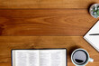 © aradaphotography - Bible with a cup of coffee on a wooden table.