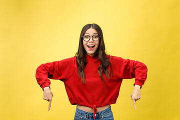 Wall Mural - young attractive asian woman who points to the finger