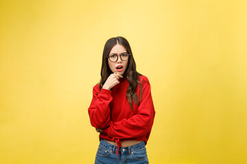 Wall Mural - Portrait Happy Asian girl is surprised she is excited.Yellow background studio