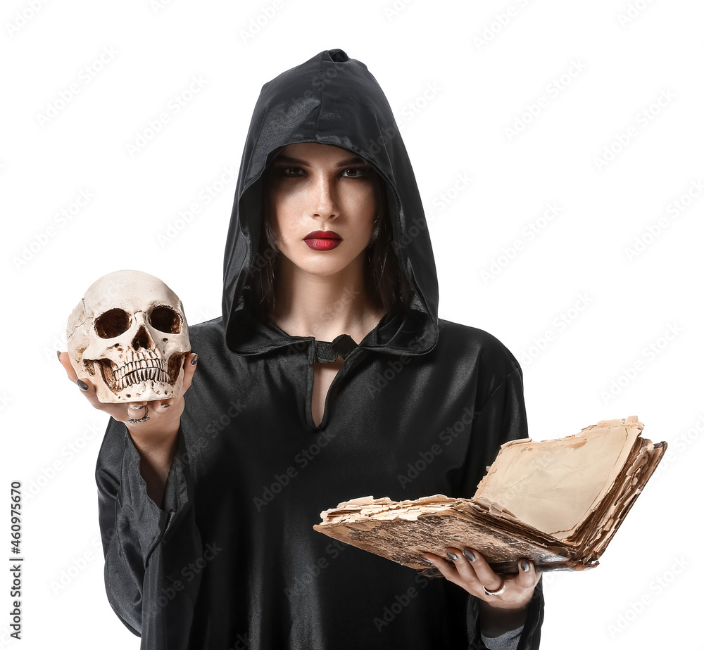 Young witch with skull and spell book on white background