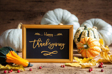 Wall Mural - autumn pumpkin decoration, text happy thanksgiving day, golden frame