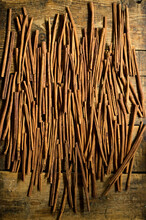 Cinnamon Sticks Lying On Wooden Surface