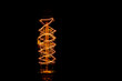 glowing lamp filaments on black background