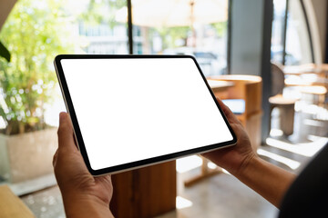 Wall Mural - mockup image of a woman holding digital tablet with blank white desktop screen