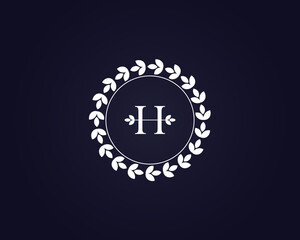 logo initials letter H. logo of nature. elegant and luxurious white texture. Design combination of letter H and nature tree. for the company's business brand. modern, simple and unique logo template.