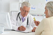 © aletia2011 - Portrait of senior doctor with a elderly patient