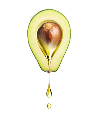 Drop of oily liquid flowing from a half of avocado on a white background