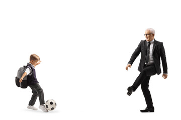 Poster - Schoolboy playing football with a man in a suit