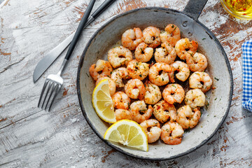 Wall Mural - Tasty fried shrimps on pan